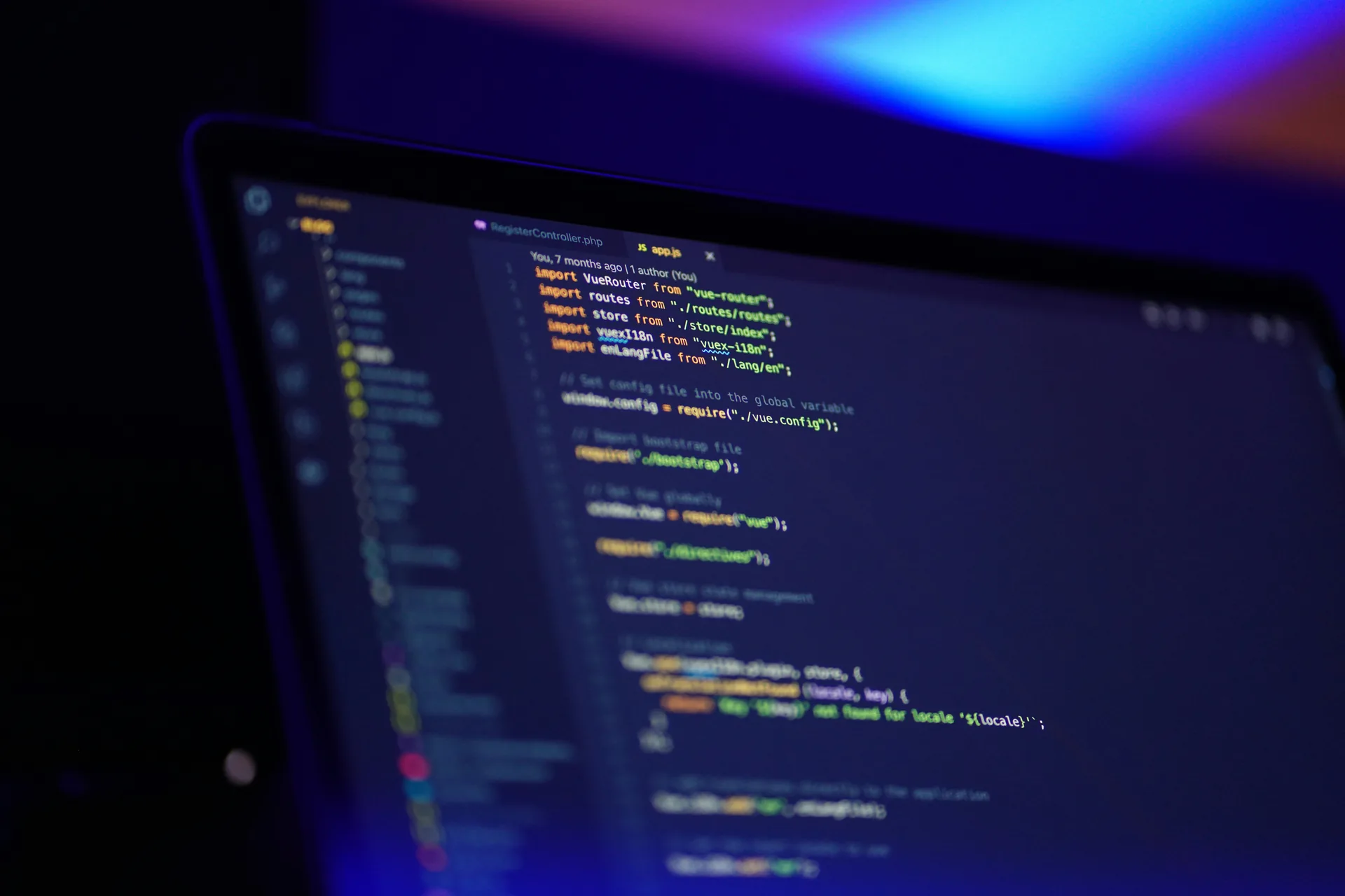 Code editor with blue interface on a monitor